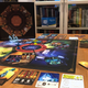 A general glimpse at the board and cards, and a peek at the inside box cover art for fun.